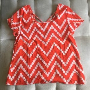 Cute orange blouse with back detailing